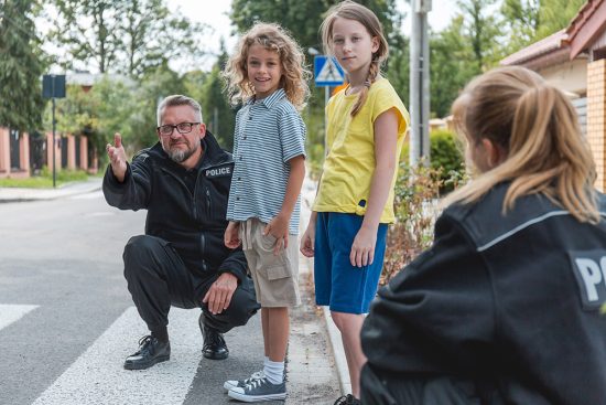policeman with kids